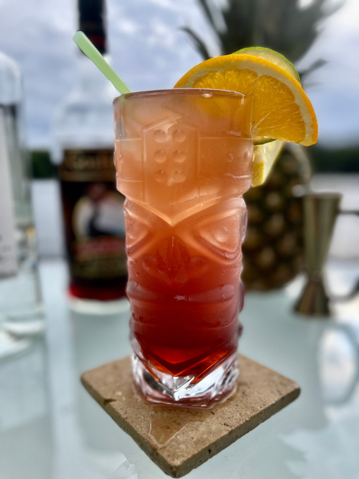 Tall angry tiki glass side view