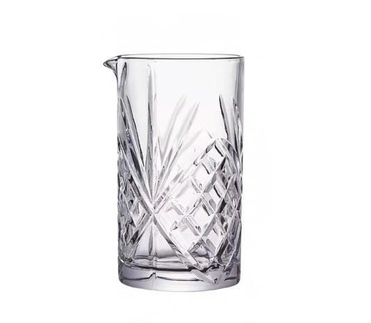 Botanical cocktail mixing glass side view